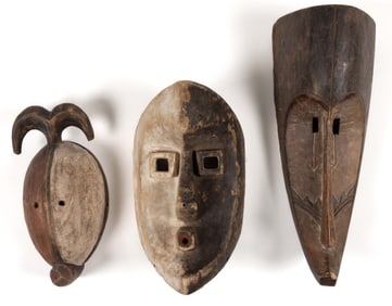 AFRICAN CARVED AND PAINTED WOODEN TRIBAL MASKS, LOT OF THREE