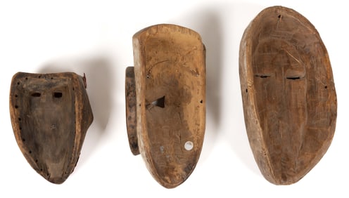 AFRICAN CARVED AND PAINTED WOODEN TRIBAL MASKS, LOT OF THREE
