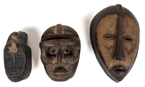 AFRICAN CARVED AND PAINTED WOODEN TRIBAL MASKS, LOT OF THREE