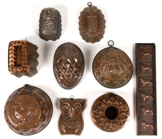 ASSORTED COPPER AND SHEET-IRON FIGURAL FOOD MOLDS, LOT OF NINE