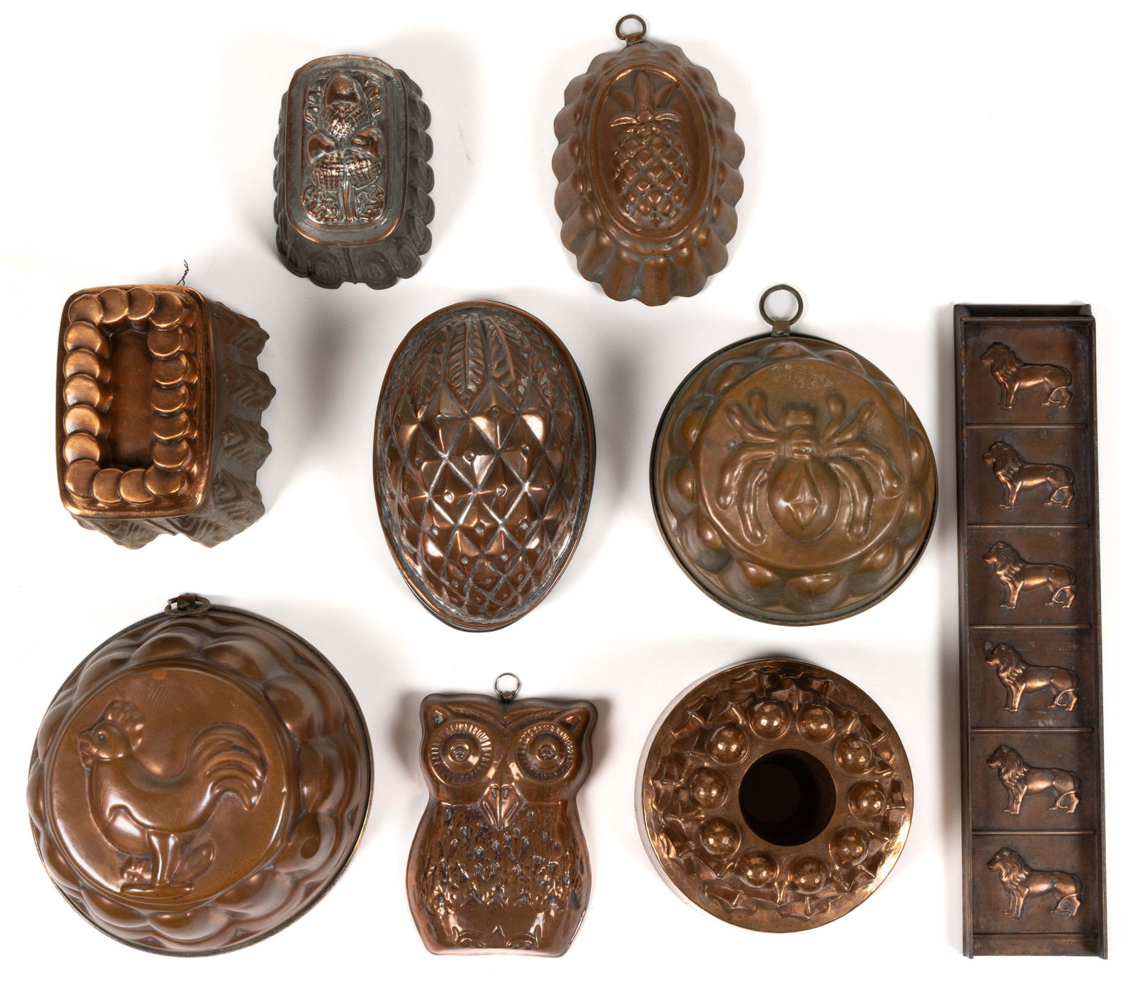 ASSORTED COPPER AND SHEET-IRON FIGURAL FOOD MOLDS, LOT OF NINE (1 of 2)