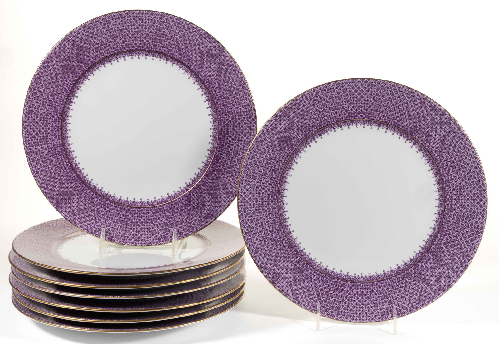 CONTEMPORARY PORTUGUESE MOTTAHEDEH PLUM LACE PORCELAIN SERVICE PLATES, LOT OF EIGHT: CONTEMPORARY PORTUGUESE MOTTAHEDEH PLUM LACE PORCELAIN SERVICE PLATES, each having rich purple border decoration with gilt rims. Each having green-printed "Mottahedeh / PORCEL / PORTUGAL". 2