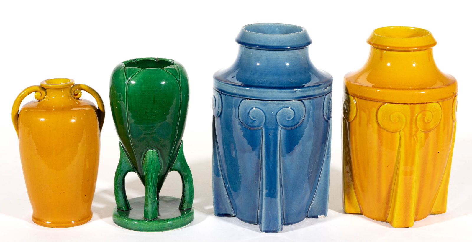 JAPANESE AWAJI POTTERY MONOCHROME VASES, LOT OF FOUR: JAPANESE AWAJI POTTERY MONOCHROME VASES, LOT OF FOUR, comprising one green-glazed example with four "legs" attached to a disc base, one yellow-glazed example with vertical scrolled handles t