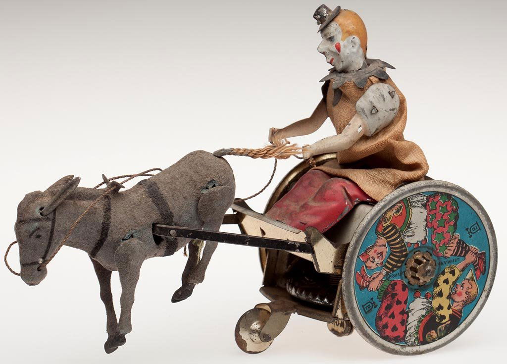 LEHMANN BALKY MULE WIND-UP TIN TOY: LEHMANN BALKY MULE WIND-UP TIN TOY, lettering on back and wheels. Early 20th century. 5" H, 7 3/4" L. Provenance: From the Rudolph Evers estate collection, Bridgewater, VA.