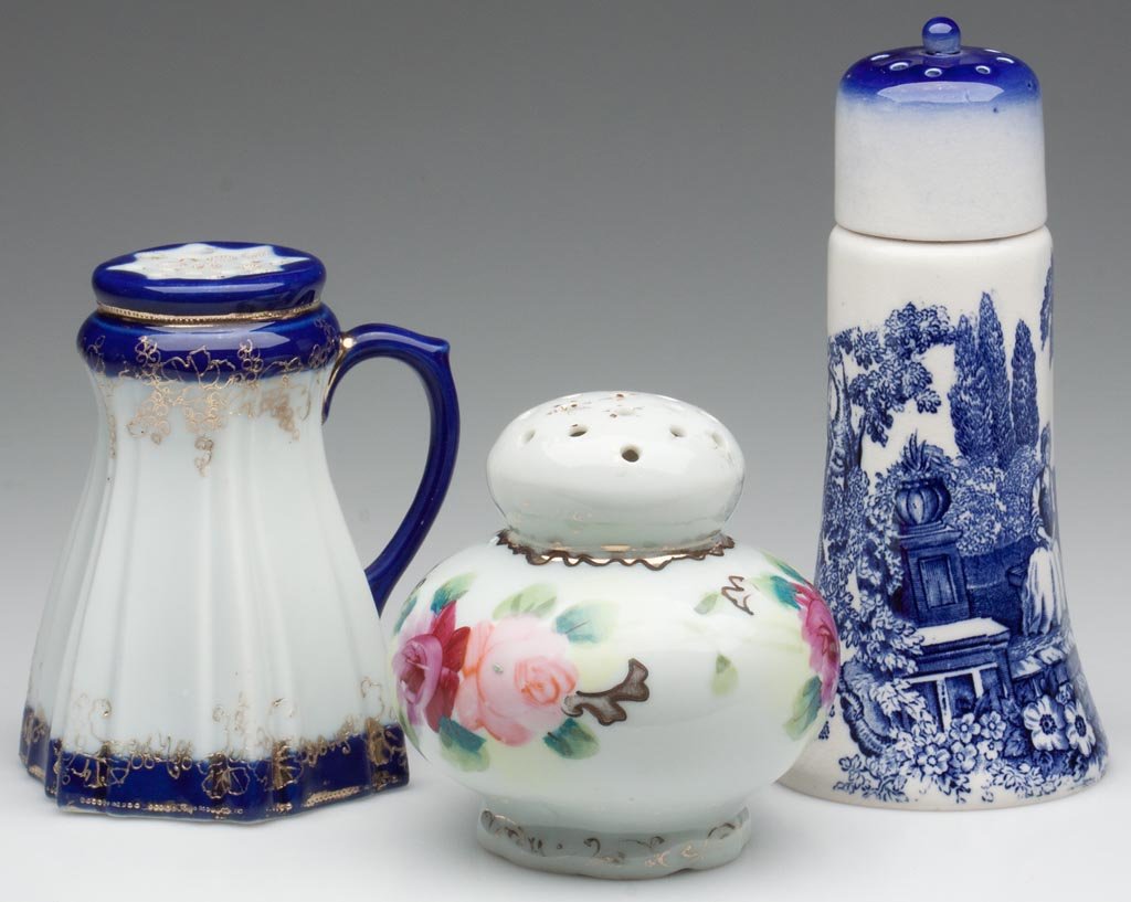 VARIOUS FLORAL DECORATED CERAMIC SUGAR SHAKERS, LOT OF : VARIOUS FLORAL DECORATED CERAMIC SUGAR SHAKERS, LOT OF TWO, white grounds with various polychrome and gilt decoration, comprising a ball form and a Nippon paneled example with handle, marked on base. 
