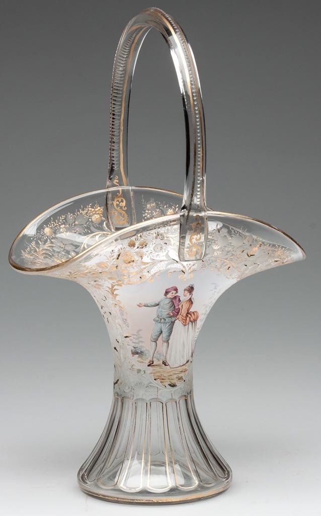 BOHEMIAN DECORATED GLASS BASKET: BOHEMIAN DECORATED GLASS BASKET, colorless, pair of finely enamel-painted Rococo figures on each side, surrounded by intricate engraved and gilded decoration, cut panels below, polished pontil mark. P