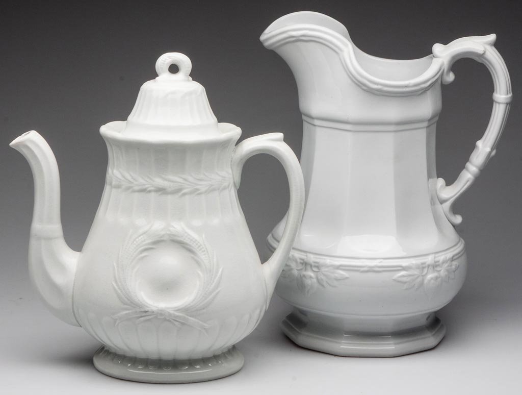 ENGLISH IRONSTONE ARTICLES, LOT OF TWO: ENGLISH IRONSTONE ARTICLES, LOT OF TWO, comprising an F. Jones Co. "Victor" pattern coffee pot and a Davenport "Fig" pattern ewer, both with factory and registry marks. Third quarter 19th century. 11"
