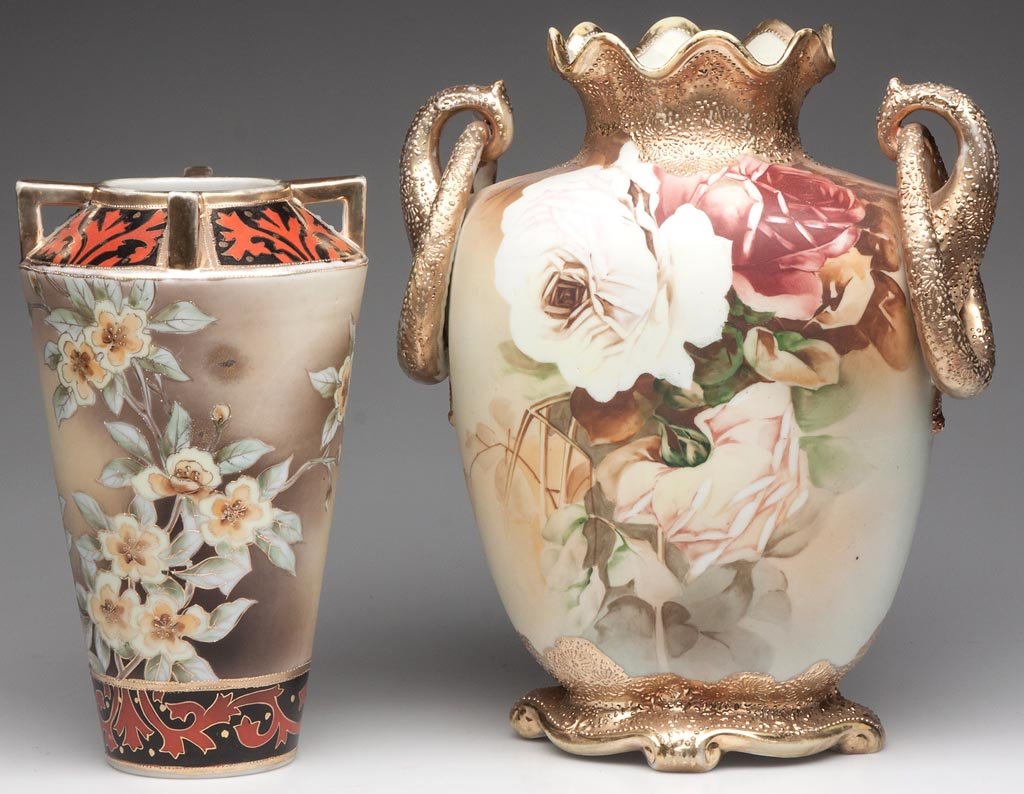 NIPPON FLORAL VASES, LOT OF TWO: NIPPON FLORAL VASES, LOT OF TWO, comprising a conical-form example with four small handles, and a pillow-form example with bail-type handles, blue maple leaf marks. First quarter 20th century. 9" and 