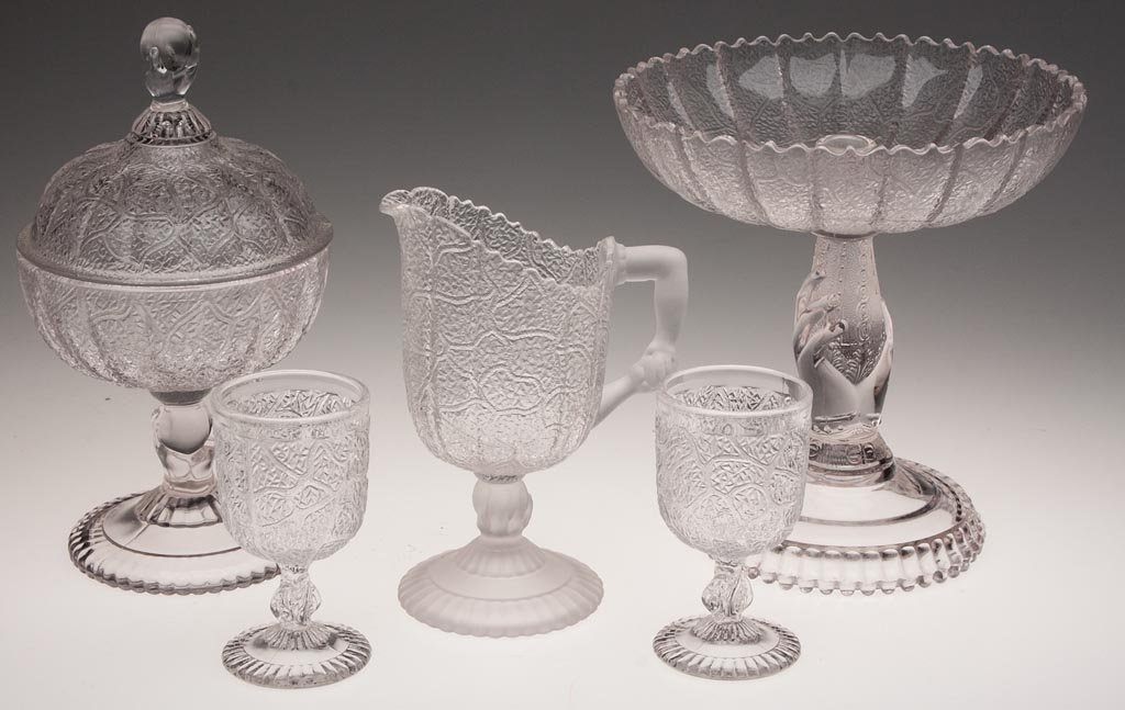 TREE OF LIFE WITH HAND VARIOUS ARTICLES, LOT OF THREE: TREE OF LIFE WITH HAND VARIOUS ARTICLES, LOT OF THREE, colorless, comprising a covered sugar, creamer and epergne bowl lacking vase. Together with two reproduction L. G. Wright Glass Co. wine glasses.