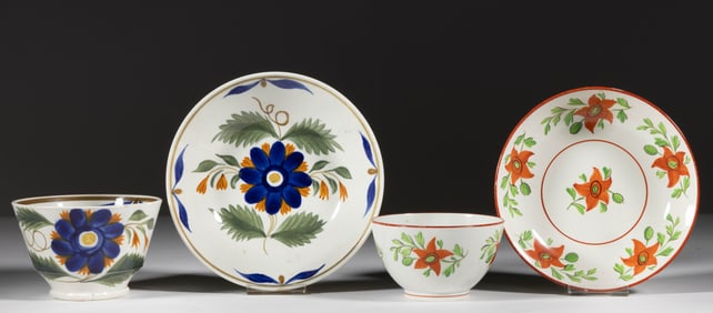 BRITISH PEARLWARE HAND-PAINTED FLORAL MOTIF CERAMIC CUP AND SAUCER SETS, LOT OF TWO