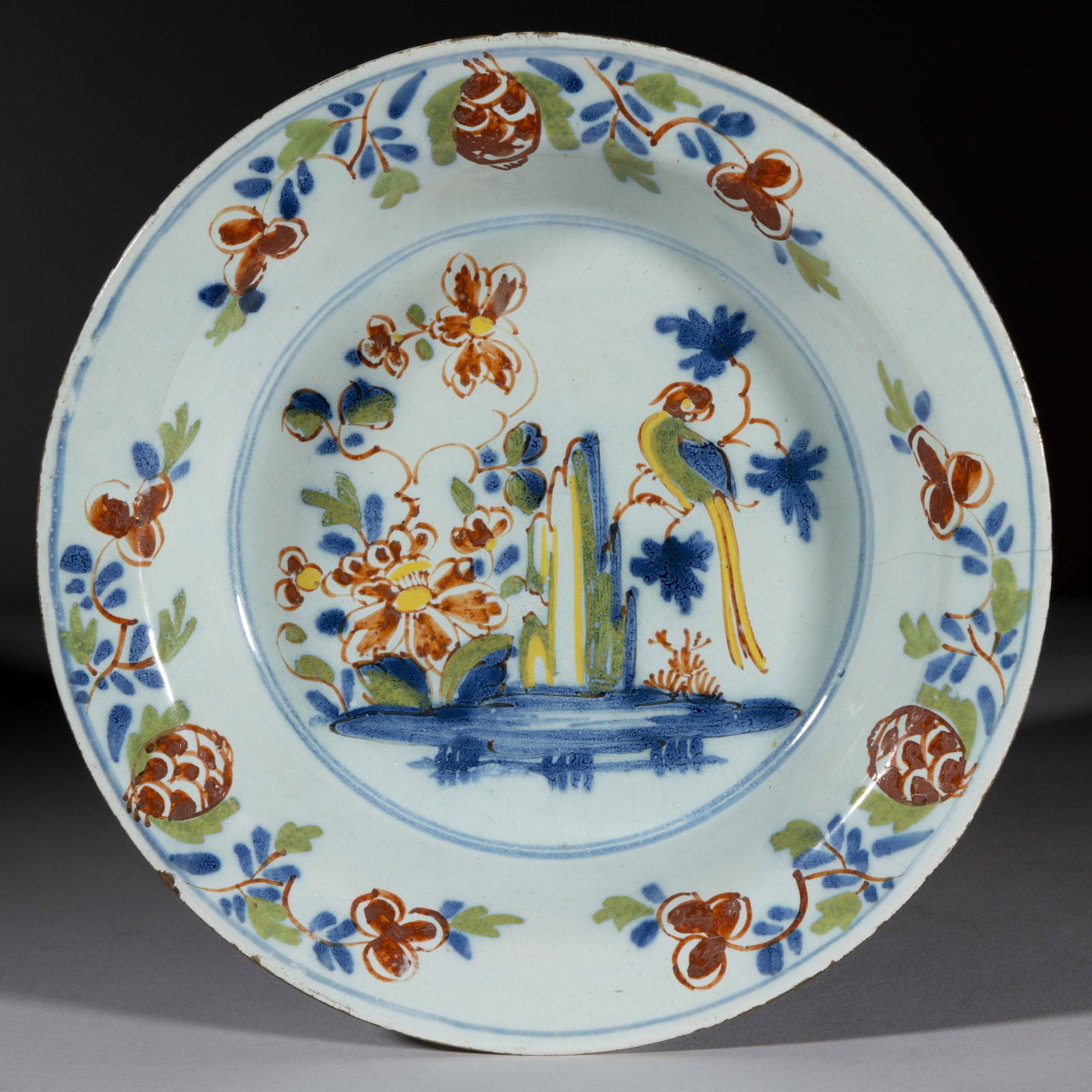 ENGLISH DELFT TIN-GLAZED BIRD MOTIF EARTHENWARE SOUP PLATE (1 of 2)