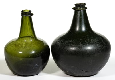 ENGLISH FREE-BLOWN BLACK GLASS SHAFT AND GLOBE UTILITY BOTTLES, LOT OF TWO