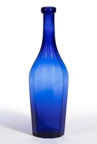 BLOWN-MOLDED PANELED COMMERCIAL COLOGNE BOTTLE