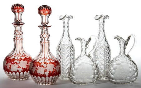 ASSORTED CUT / ENGRAVED GLASS DECANTERS. LOT OF SIX