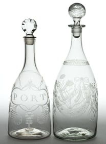 FREE-BLOWN AND ENGRAVED GLASS DECANTERS, LOT OF TWO