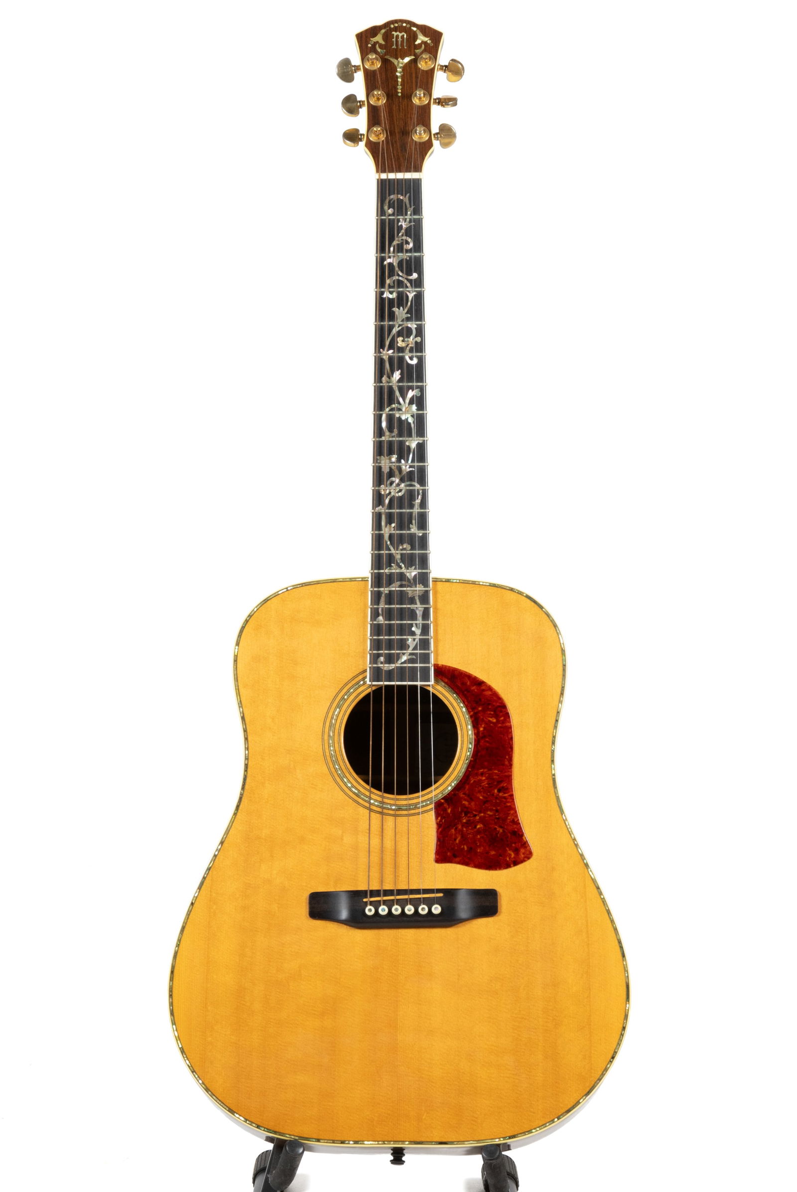 1976 S.L. MOSSMAN GOLDEN ERA NATURAL ACOUSTIC GUITAR: 1976 S.L. MOSSMAN GOLDEN ERA NATURAL ACOUSTIC GUITAR, serial number 72-3719, six string, spruce top with abalone inlay rosette and edges, faux tortoise shell pickguard, rosewood sides and back with in
