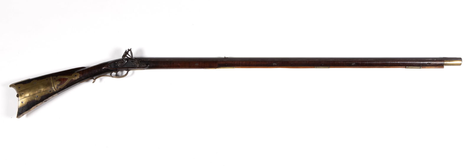 JOHN YOUNG, EASTON, PENNSYLVANIA ATTRIBUTED KENTUCKY-STYLE FLINT-LOCK LONG RIFLE: JOHN YOUNG, EASTON, PENNSYLVANIA ATTRIBUTED KENTUCKY-STYLE FLINT-LOCK LONG RIFLE, approximately .48 caliber octagonal barrel, tiger maple fullstock with elaborate brass furniture including four-p