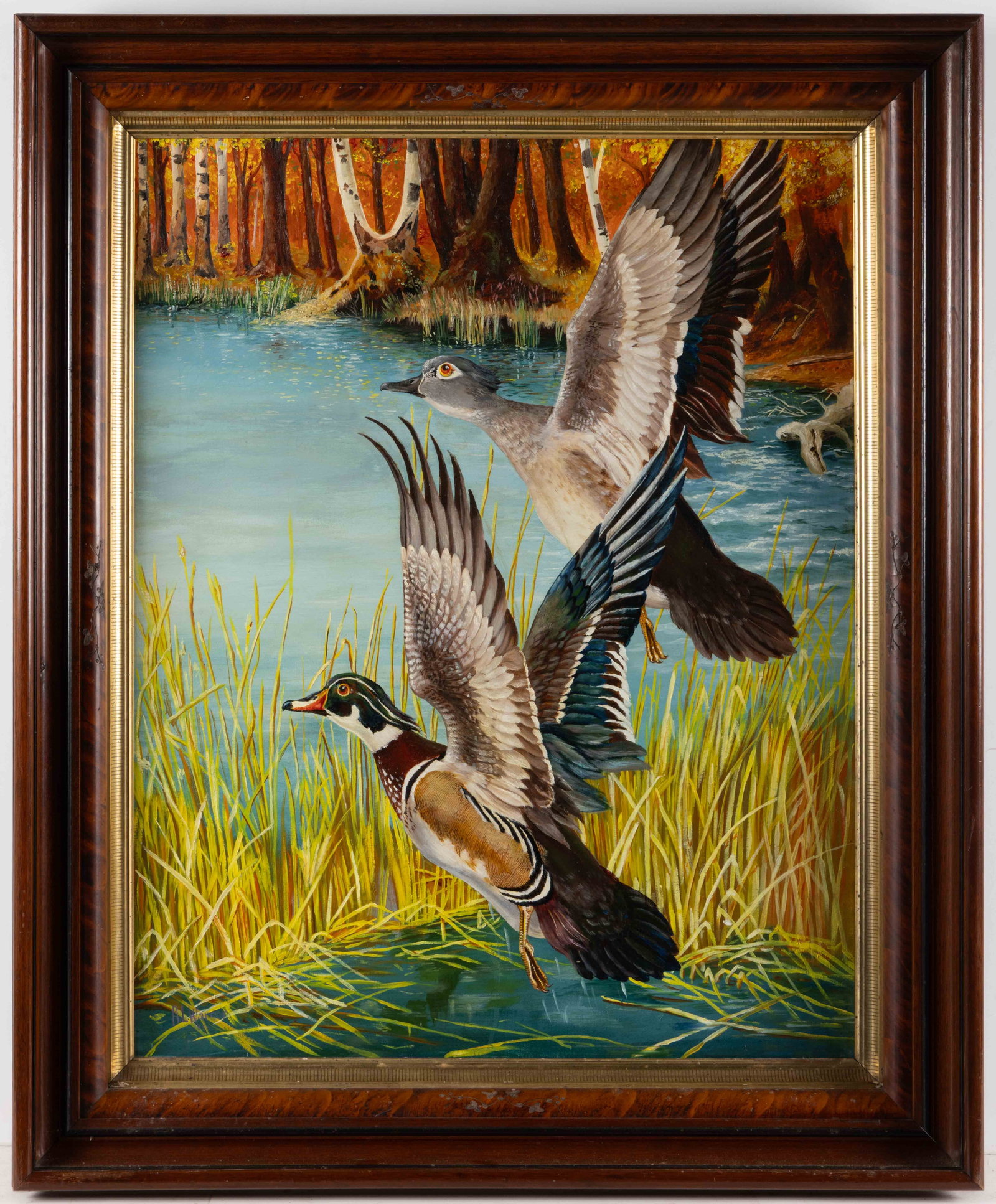 AMERICAN SCHOOL (20TH CENTURY) HUNTING / SPORTING PAINTING: AMERICAN SCHOOL (20TH CENTURY) HUNTING / SPORTING PAINTING, oil on canvas, featuring two wood ducks in flight with autumnal wetland setting in the background, signed and dated lower left "A. L. W