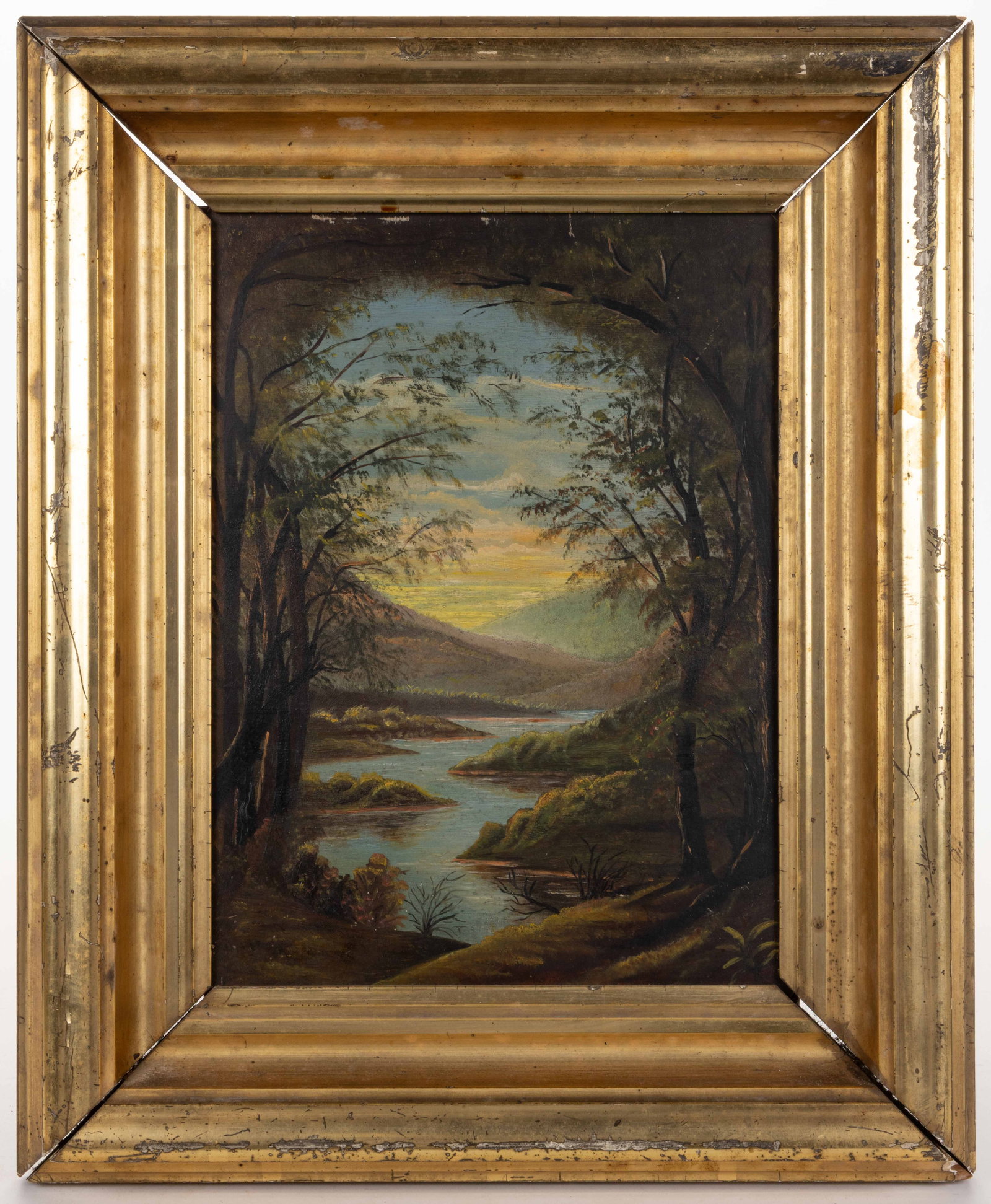 AMERICAN SCHOOL (19TH CENTURY) FOLK ART LANDSCAPE PAINTING: AMERICAN SCHOOL (19TH CENTURY) FOLK ART LANDSCAPE PAINTING, oil on board, a twilight view featuring a winding river framed by trees in a mountainous setting, no signature located. Housed in a 19t