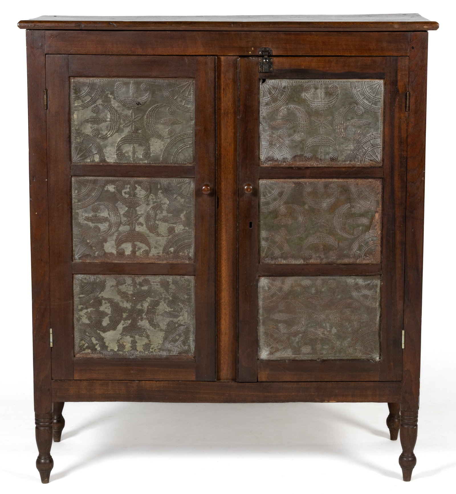 ROCKINGHAM / PAGE CO., SHENANDOAH VALLEY OF VIRGINIA WALNUT AND POPLAR PUNCHED-TIN-PANELED FOOD /: ROCKINGHAM / PAGE CO., SHENANDOAH VALLEY OF VIRGINIA WALNUT AND POPLAR PUNCHED-TIN-PANELED FOOD / PIE SAFE, the rectangular overhanging top over two hinged cabinet doors divided by a recessed center s