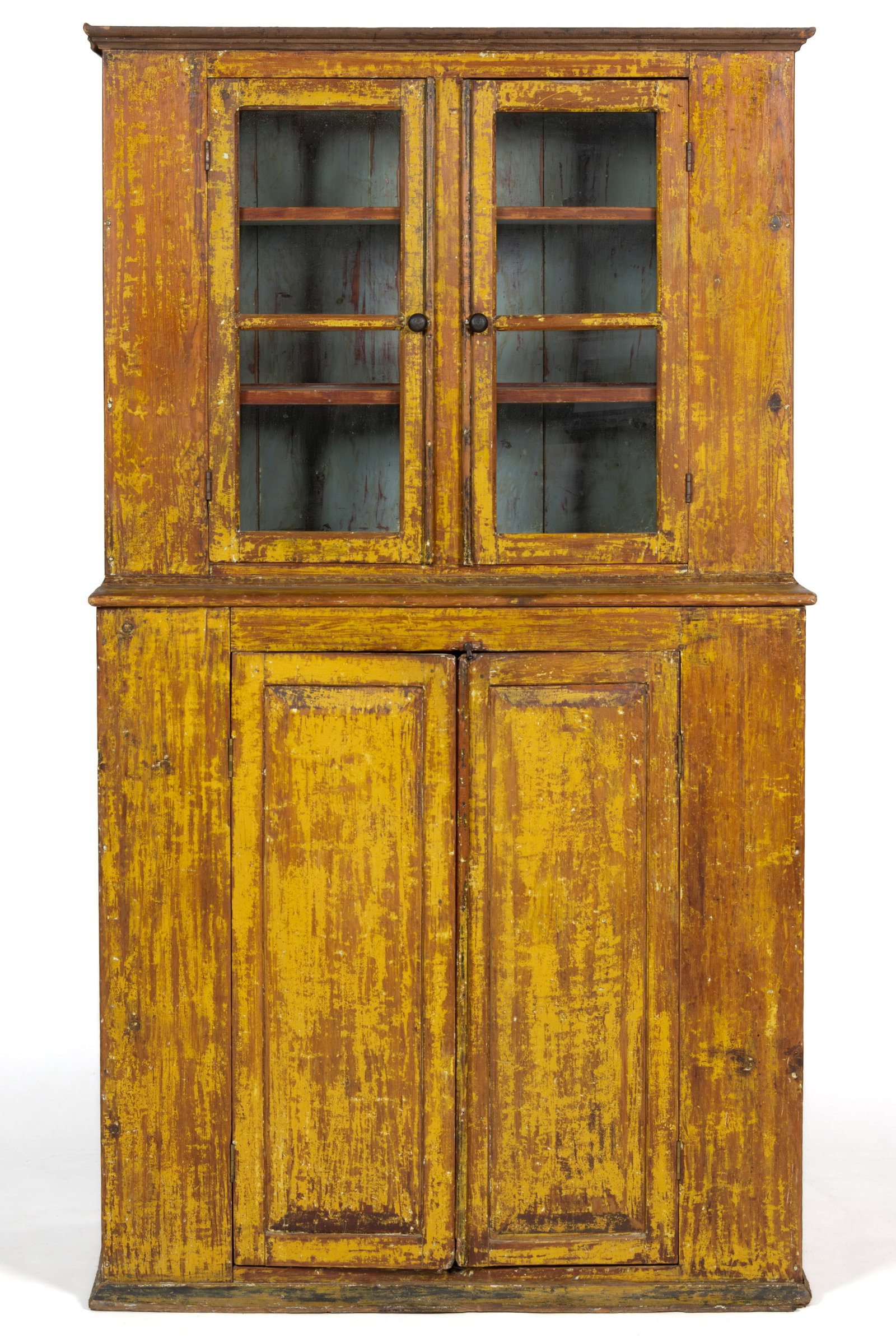 MID-ATLANTIC PAINTED YELLOW PINE AND POPLAR KITCHEN CUPBOARD: MID-ATLANTIC PAINTED YELLOW PINE AND POPLAR KITCHEN CUPBOARD, of single-piece form, the applied cornice molding over two two-pane hinged cabinet doors concealing two fixed shelves, above a lower cabin