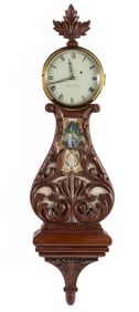 ELMER O. STENNES, WEYMOUTH, MASSACHUSETTS, CARVED WALNUT LYRE BANJO CLOCK