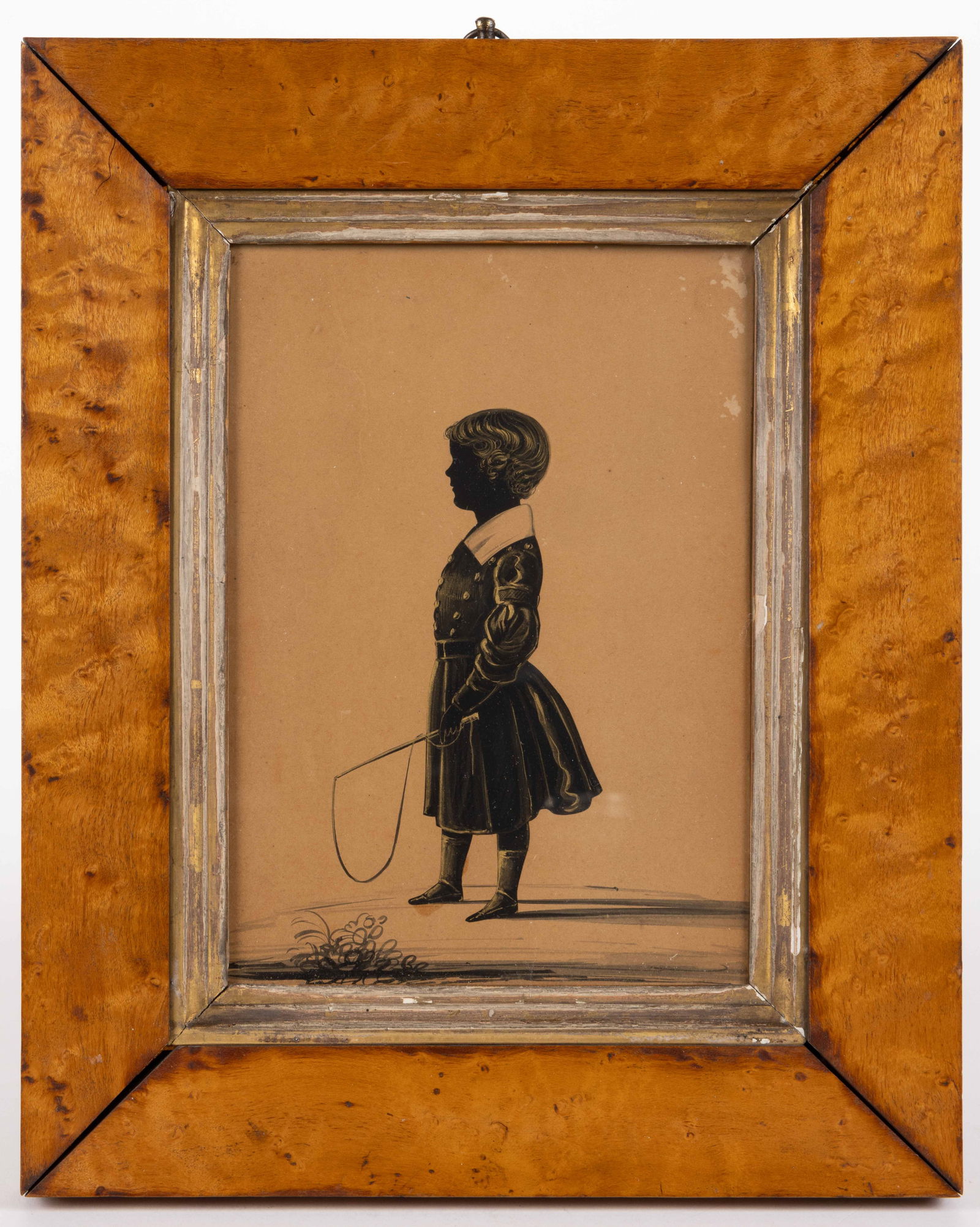 AMERICAN / BRITISH SCHOOL (19TH CENTURY) CUT-AND-PASTED SILHOUETTE: AMERICAN / BRITISH SCHOOL (19TH CENTURY) CUT-AND-PASTED SILHOUETTE, with gouache and fine gilt detailing, depicting a girl in a dress holding a whip, typed label "Eliza Kirby" and inked