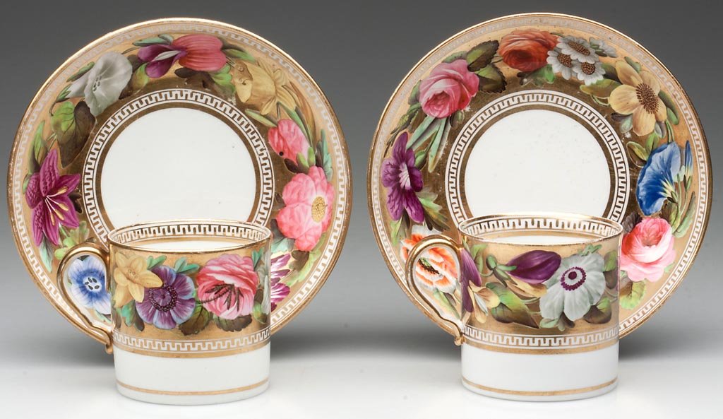 SPODE PORCELAIN RARE GOLD-GROUND ARTICLES, LOT OF FOUR: SPODE PORCELAIN RARE GOLD-GROUND ARTICLES, LOT OF FOUR, comprising two coffee cans and saucers, each painted with gilt line rims framing a broad gold band painted boldly in reserve, with large and col