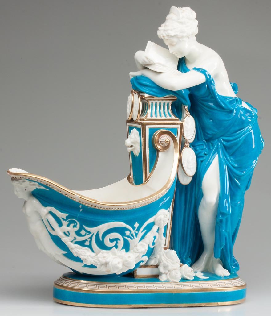 MINTON PORCELAIN FIGURAL CENTERPIECE: MINTON PORCELAIN FIGURAL CENTERPIECE, "The Reader" formed as a figure behind an ovular vase/bowl, the classically-garbed, reading figure leaning on a pillar behind an inverted helmet-form vase, all on