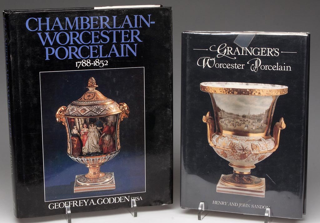 TWO BOOKS ON WORCESTER PORCELAIN FACTORIES: TWO BOOKS ON WORCESTER PORCELAIN FACTORIES, comprising "Chamberlain-Worcester Porcelain 1788-1852," by Geoffrey A. Godden and "Grainger's Worcester Porcelain," by Henry and John Sandon. Provenance: Fr
