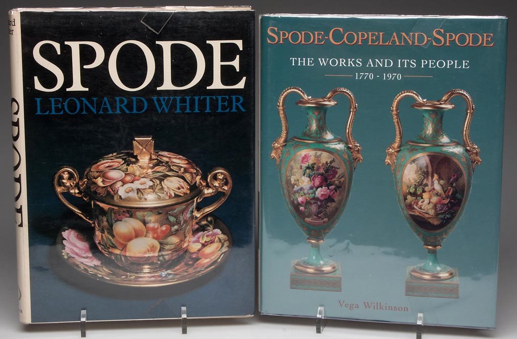 TWO REFERENCE VOLUMES ON SPODE PORCELAIN: TWO REFERENCE VOLUMES ON SPODE PORCELAIN, comprising "Spode," by Leonard Whitier and "Spode-Copeland-Spode, The Works and its People, 1770-1980," by Vega Wilkinson. Provenance: From the library of Lor