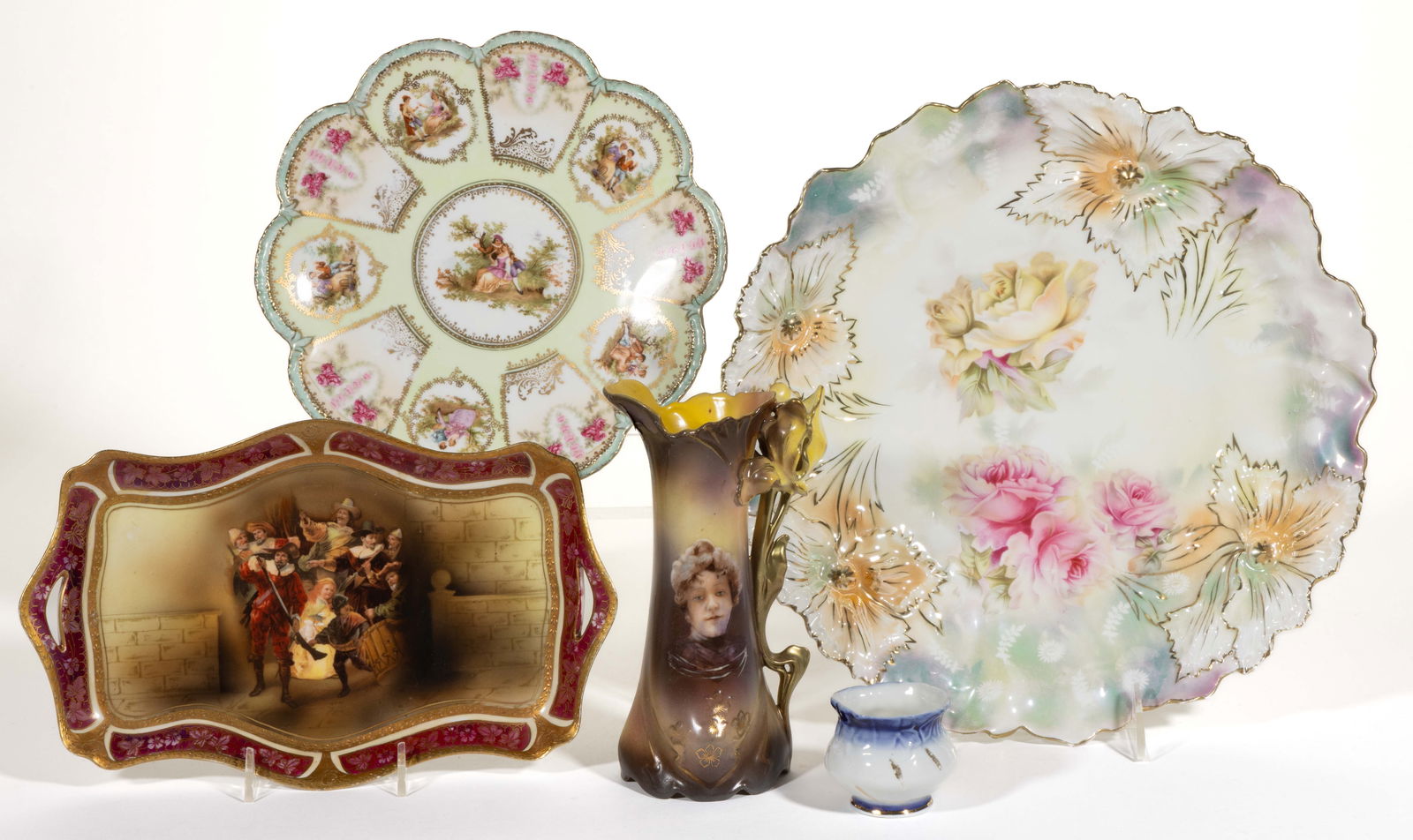 R.S. GERMANY / PRUSSIA AND OTHER PORCELAIN ARTICLES, LOT OF FIVE: R.S. GERMANY / PRUSSIA AND OTHER PORCELAIN ARTICLES, LOT OF FIVE, comprising an RVG Mold 5 ewer with molded iris handle featuring polychrome transfer Flossie portrait, an 11 3/4" D RSP Mold