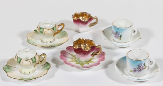 R.S. PRUSSIA PORCELAIN MINIATURE / TOY CUPS AND SAUCERS, LOT OF 11