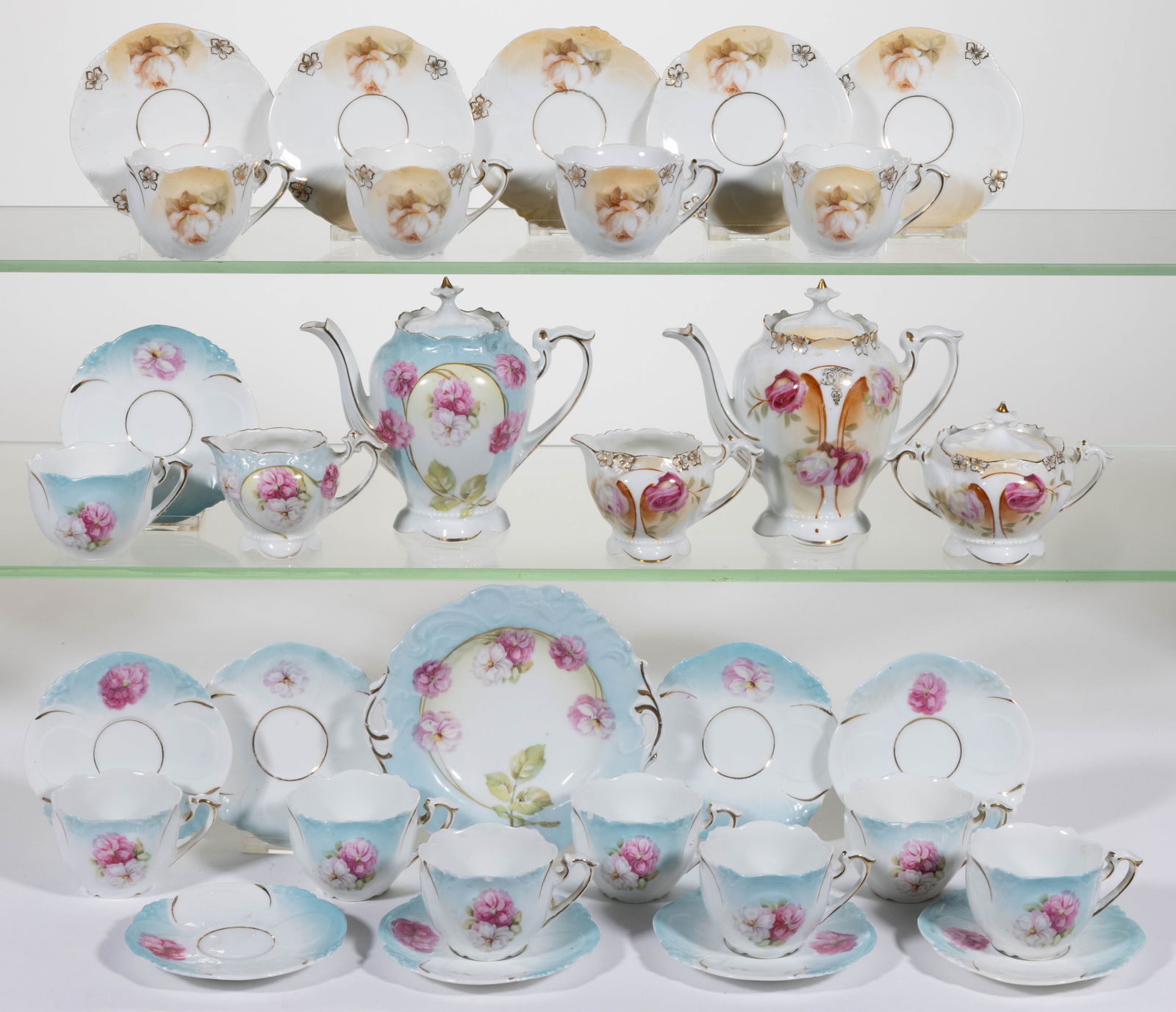 R.S. PRUSSIA PORCELAIN PARTIAL CHILDREN'S TEA SETS, LOT OF 32 PIECES (1 of 1)