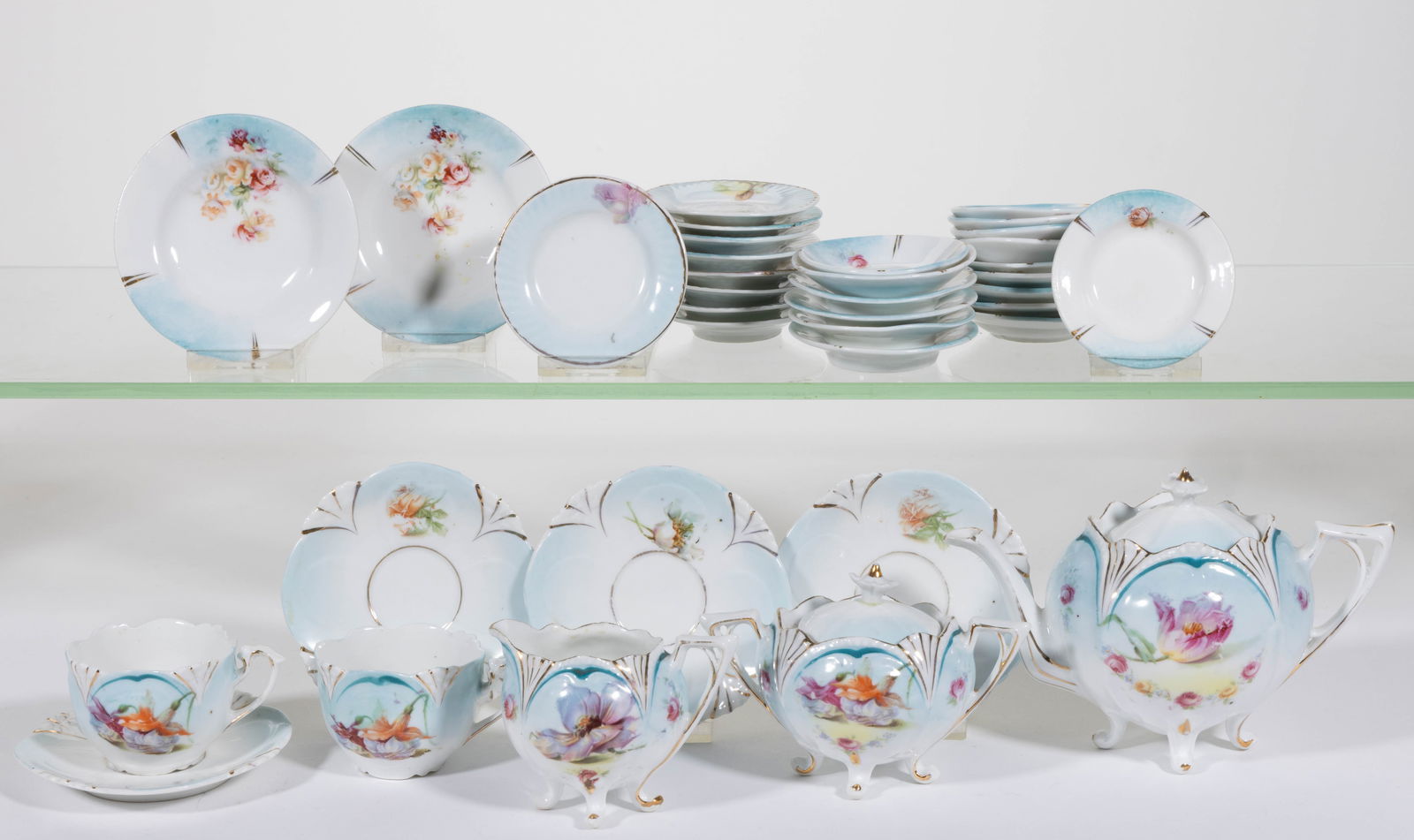 R.S. PRUSSIA PORCELAIN BLUE-ACCENTED FLORAL MOTIF CHILDREN'S TEA ARTICLES, LOT OF 36 (1 of 1)