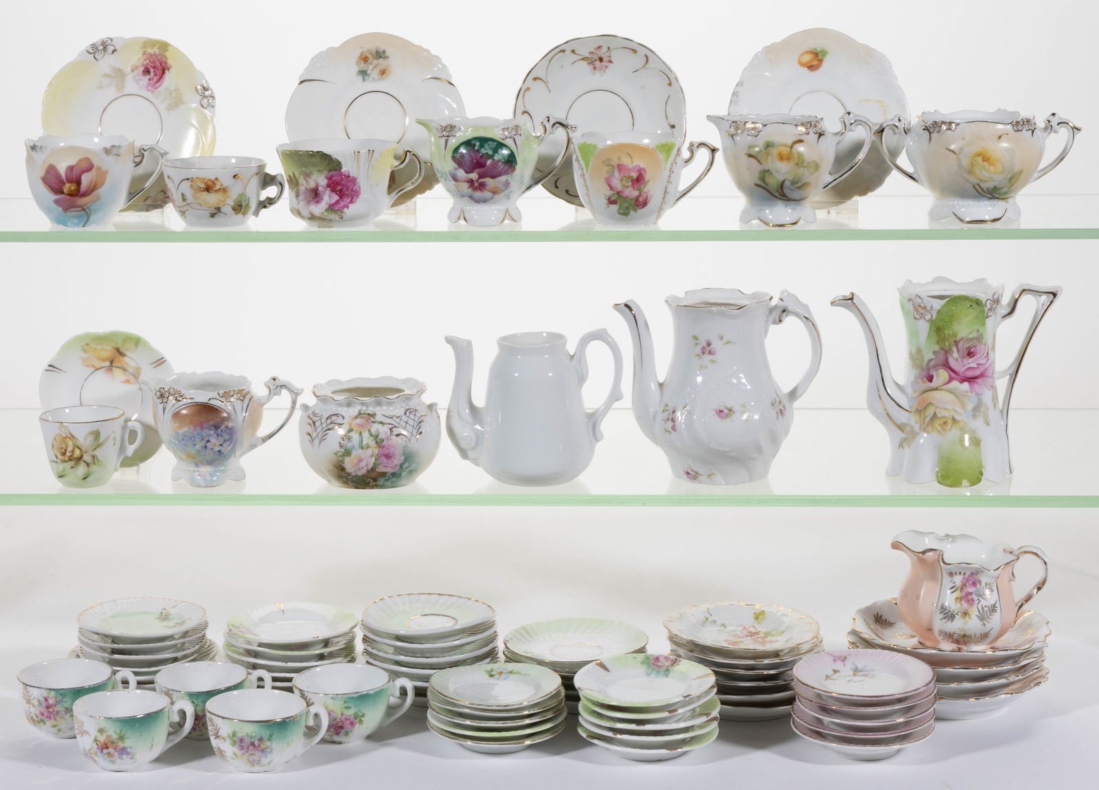 R.S. PRUSSIA AND OTHER RELATED PORCELAIN CHILDREN'S ARTICLES, UNCOUNTED LOT: R.S. PRUSSIA AND OTHER RELATED PORCELAIN CHILDREN'S ARTICLES, UNCOUNTED LOT, more than 65, including three teapots lacking covers, two sugars lacking covers, three creamers, five matching cups hav