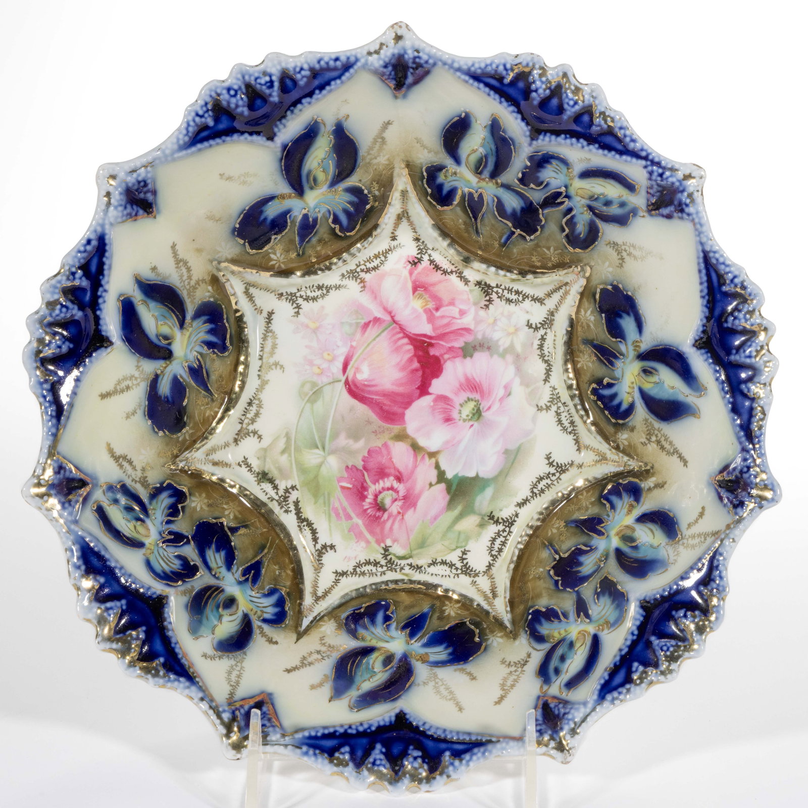 R.S. PRUSSIA PORCELAIN COBALT FLORAL MOTIF BOWL: R.S. PRUSSIA PORCELAIN COBALT FLORAL MOTIF BOWL, RSP Mold 94, featuring cobalt and yellow iris with gilt accents to border and polychrome transfer poppy motif to center. Red- and green-printed "R