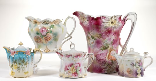 R.S. PRUSSIA PORCELAIN FLORAL MOTIF JUGS / PITCHERS, LOT OF FIVE