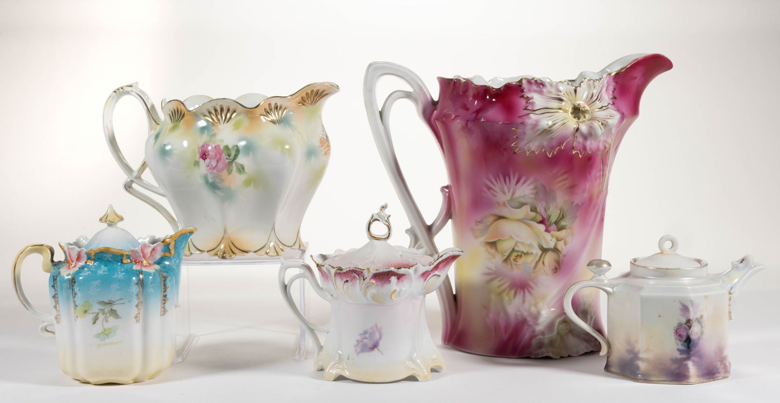 R.S. PRUSSIA PORCELAIN FLORAL MOTIF JUGS / PITCHERS, LOT OF FIVE - 2