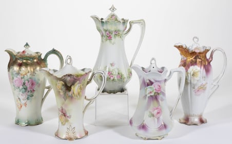 R.S. PRUSSIA PORCELAIN FLORAL MOTIF CHOCOLATE POTS, LOT OF FIVE