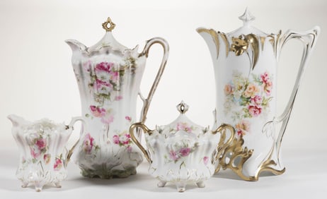 R.S. PRUSSIA PORCELAIN FLORAL MOTIF CHOCOLATE ARTICLES, LOT OF FOUR