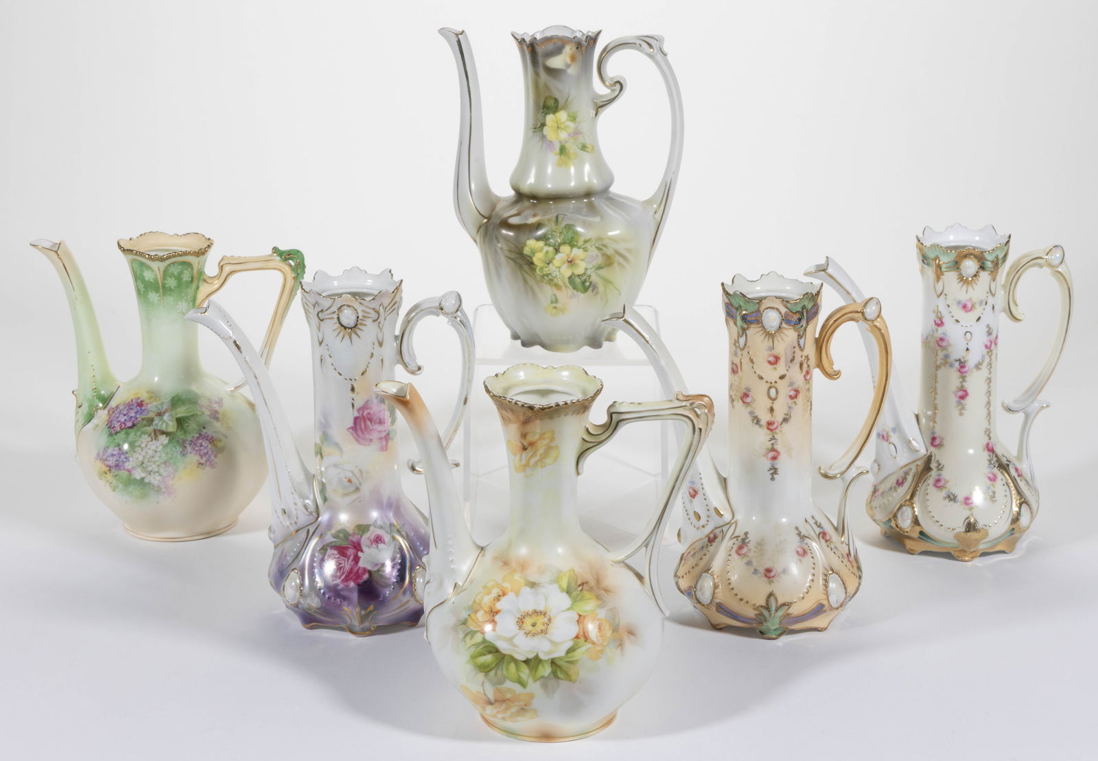 R.S. PRUSSIA PORCELAIN FLORAL MOTIF DEMITASSE POTS, LOT OF SIX: R.S. PRUSSIA PORCELAIN FLORAL MOTIF DEMITASSE POTS, LOT OF SIX, each lacking cover, comprising one RSP Mold 508 example having delicate yellow flower transfer decoration, two RSP Mold 474 examples