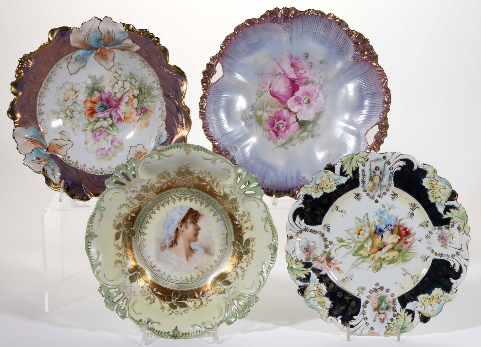 R.S. PRUSSIA AND OTHER PORCELAIN TABLE ARTICLES, LOT OF FOUR: R.S. PRUSSIA AND OTHER PORCELAIN TABLE ARTICLES, LOT OF FOUR, comprising a RSP Mold 211a cake plate featuring pink poppies with satin finish, a RS Steeple Mold 3 cake plate with two allegorical transf