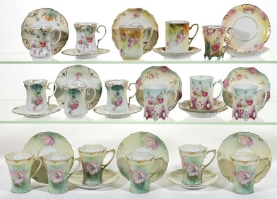 R.S. PRUSSIA PORCELAIN FLORAL MOTIF CUPS AND SAUCERS, LOT OF 35