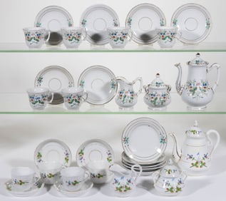 CONTINENTAL HAND-PAINTED FLORAL MOTIF CERAMIC CHILDREN'S TEA SETS, LOT OF 31 PIECES