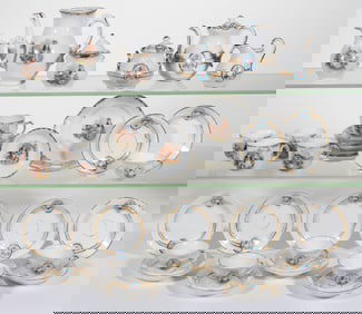 GERMAN PORCELAIN CHILDREN'S TEA SETS, LOT OF 37 PIECES