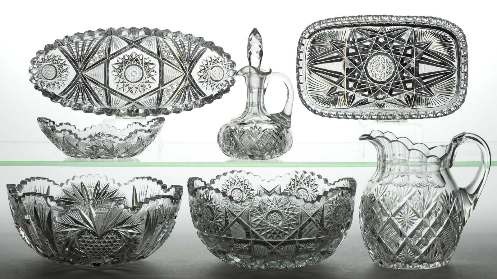 AMERICAN BRILLIANT CUT GLASS ARTICLES, LOT OF SEVEN: AMERICAN BRILLIANT CUT GLASS ARTICLES, LOT OF SEVEN, colorless, including a signed Libbey rectangular tray, a signed Fry celery dish, a Heart bowl, and a Strawberry Diamond and Star small pitcher/jug.