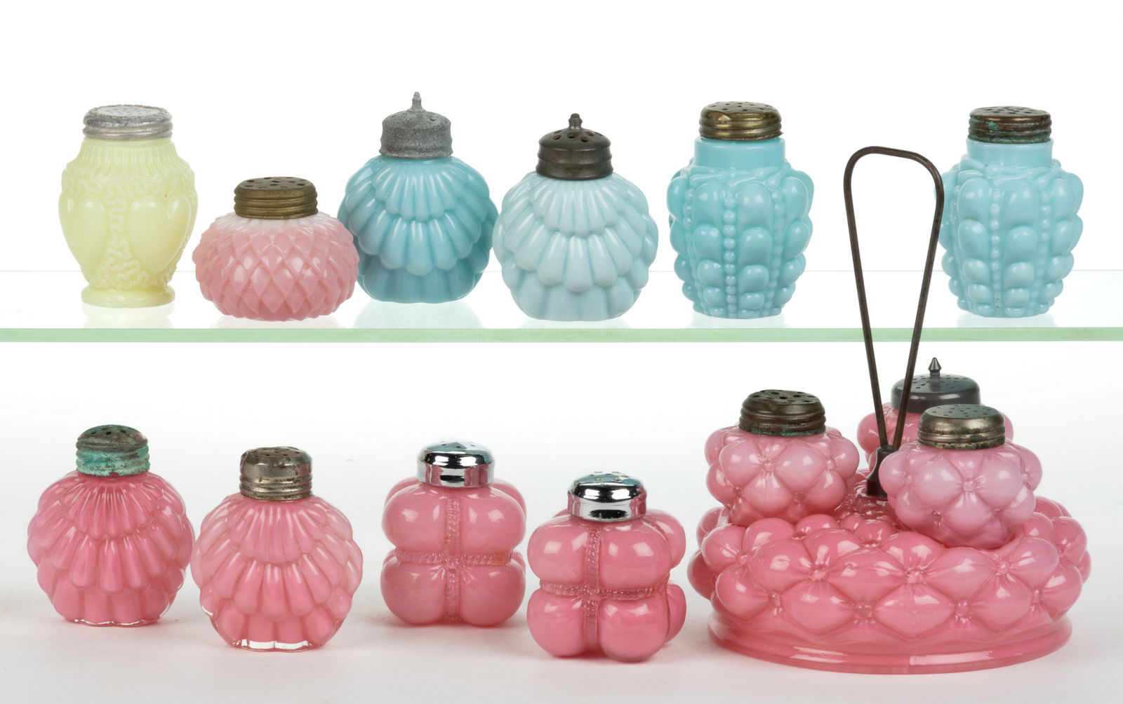 ASSORTED VICTORIAN OPAQUE GLASS SALT AND PEPPER SHAKERS, LOT OF 11: ASSORTED VICTORIAN OPAQUE GLASS SALT AND PEPPER SHAKERS, LOT OF 11, opaque blue, pink, and yellow (reacts under black light), comprising a Bulging Petal caster set, two Cotton Bails, a Dithr