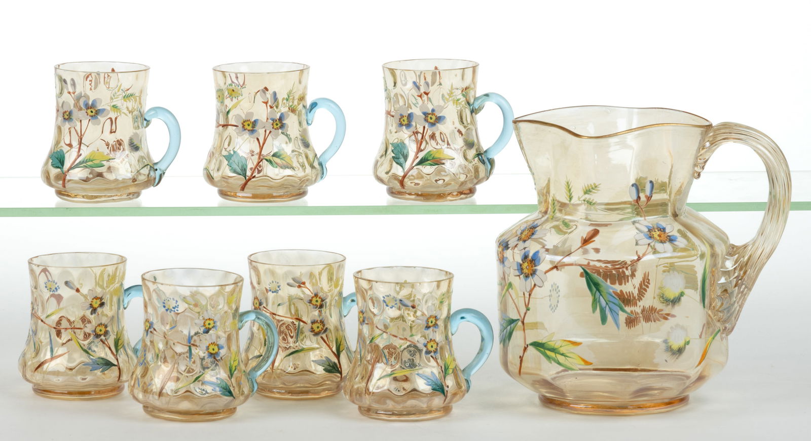 VICTORIAN DECORATED OPTIC EIGHT-PIECE ASSEMBLED WATER SET: VICTORIAN DECORATED OPTIC EIGHT-PIECE ASSEMBLED WATER SET, pale amber with a hint of iridescence, overall heavy polychrome floral and gilt decoration, comprising a Panel-Optic pitcher with a squa