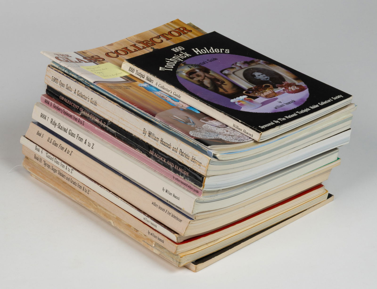 WILLIAM HEACOCK VICTORIAN GLASS REFERENCE VOLUMES, LOT OF 14: WILLIAM HEACOCK VICTORIAN GLASS REFERENCE VOLUMES, LOT OF 14, including a complete eight-volume set of Encyclopedia of Victorian Colored Pattern Glass and 5,000 Open Salts: A Collector&